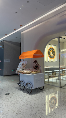 Triciclo multifuncional para entrega de alimentos em fábricas de alimentos e bebidas